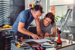 When remodeling a kitchen, do you do floors or cabinets first?